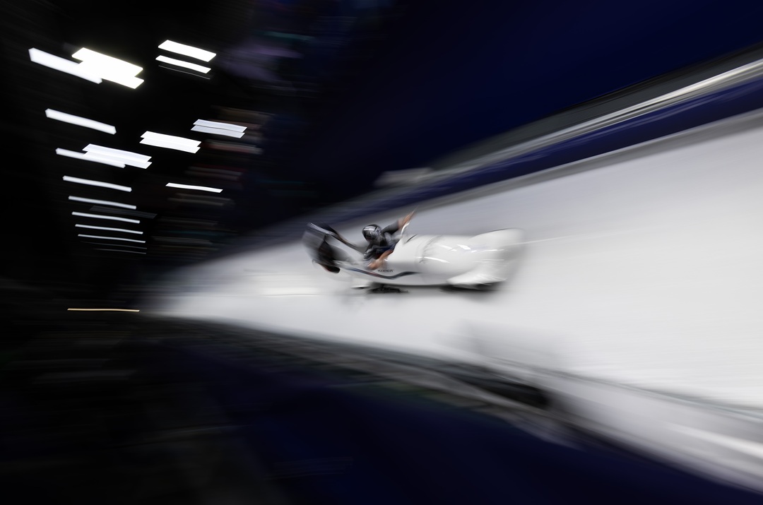 CORTINA D'AMPEZZO, ITALY - FEBRUARY 17:  Pilot Jinsu Kim and Hyeonggeun Kim of Team Republic of Korea start the Two-Man Bobsleigh Heat 4 on day 11 of the Milano Cortina 2026 Winter Olympic games at Cortina Sliding Centre on February 17, 2026 in Cortina d'Ampezzo, Italy.   (Photo by Al Bello/Getty Images)