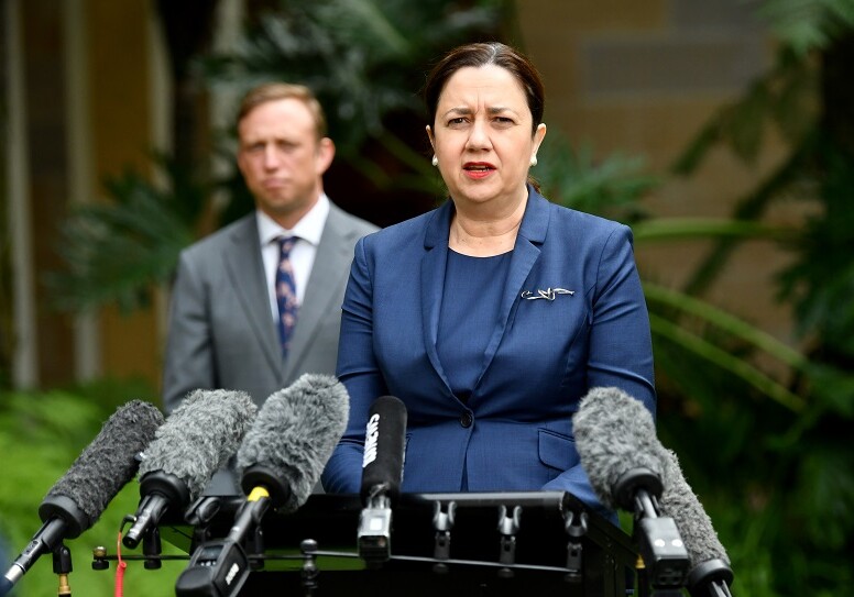 Queensland Premier Annastacia Palaszczuk (right) and Deputy Premier and Minister for Health and Minister for Ambulance Services, Steven Miles (left) are seen during a press conference at Queensland Parliament House in Brisbane, Wednesday, May 27, 2020. Premier Palaszczuk announced that a 30 year old man from the central Queensland town of Blackwater who died overnight has tested positive to COVID-19.  (AAP Image/Darren England) NO ARCHIVING